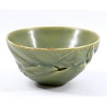 JEAN-FRANCOIS FOUILHOUX (born 1947); a heavily textured stoneware bowl covered in a jade-like