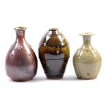 JOHN JELFS (born 1946); two stoneware bottles and a vase, various glazes, impressed JJ marks,