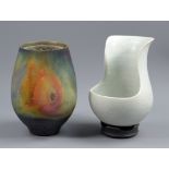 TIM ANDREWS (born 1960); a porcelain pot of cut away form covered in white crackle glaze with raku