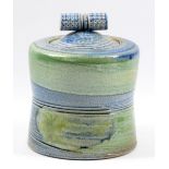 JANE HAMLYN (born 1940); a salt-glazed jar and cover of slightly waisted form, incised decoration