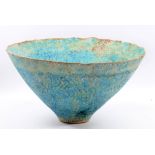 PETER BEARD (born 1951); a large conical stoneware bowl covered in turquoise glaze with swirling