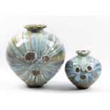 ALEX SHIMWELL (born 1980); a stoneware vase covered in running chun-like blue and ash glaze, side-