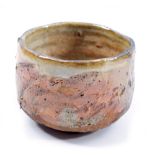 CHARLES BOUND (born 1939); a stoneware chawan, wood-fired, impressed marks, height 7.5cm.