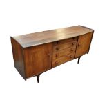 JOHN HERBERT FOR YOUNGER LTD; a teak sideboard set with four long drawers between cupboard doors
