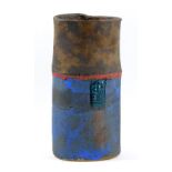 ROBIN WELCH (born 1936); an oval stoneware vessel with bands of bronze, red and blue glaze and a