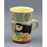 MAUREEN MINCHIN (born 1954); a large slip decorated earthenware mug featuring a puffin and fish,