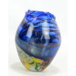 NORMAN STUART CLARKE; a blue glass 'Pond Life' vase with multicoloured decoration and signed to