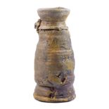 CHARLES BOUND (born 1939); a tall stoneware vessel with lug handle, wood-fired, impressed marks,