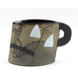 JOHN MALTBY (born 1936); a stoneware cup form decorated with a stylised landscape, painted