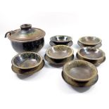 ABDO NAGI (1941-2001); a stoneware soup tureen with ladle and six soup bowls and saucers, mottled