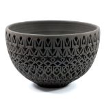 AMBERLEA McNAUGHT (born 1990); a large carved black stoneware bowl, diameter 27.5cm.Additional