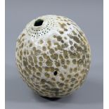 ALAN WALLWORK (born 1931); a stoneware seed pod form perforated on one side, incised AW mark, height