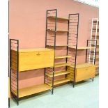 LADDERAX; a teak wall unit comprising four ladders, record cabinet, bureau, seven narrow and two