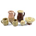 RICHARD BATTERHAM (born 1936); a salt-glazed jug and another stoneware jug covered in tenmoku