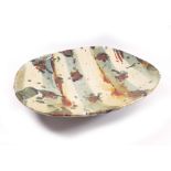 JOHN MALTBY (born 1936); a large oval stoneware dish with abstract decoration, impressed M mark,