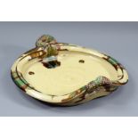 TAKESHI YASUDA (born 1943); a stoneware twin-handled platter covered in sancai decoration, impressed