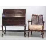 An early 20th century mahogany bureau with quarter-matched and sapele veneered fall,