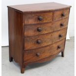 A small George III mahogany bow-front chest of two-over-three drawers with knob handles and on