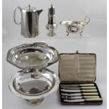 A small group of plated items to include sauce boat, sugar caster, cake tazza, cake basket,