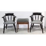 A pair of 20th century captain-style chairs on turned supports and cross-stretcher and an Edwardian