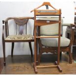 An Edwardian mahogany inlaid salon chair with bergère inset to back,