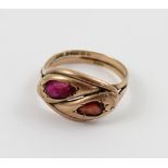 A gentlemen's 9ct gold snake dress ring set with two red stones, size S, approx 3.8g.