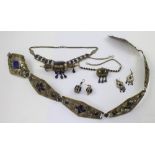 A quantity of white and yellow metal Afghan wedding and tribal jewellery to include a belt set with