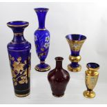 Four non-matching Venetian Bristol blue colour and gilded glass vases to include a large baluster