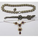A late 19th century white metal necklace made from sphere-mounted rectangular links and bright-cut