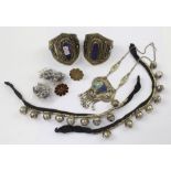 A quantity of white and yellow metal Afghan wedding and tribal jewellery to include a pair of bell