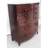 A large George III bow-front chest of two-over-four drawers,