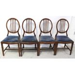 A set of four Edwardian inlaid mahogany dining chairs,