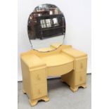 A retro c1950s mirror-back yellow painted dressing table,