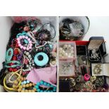 A large quantity of vintage and contemporary costume jewellery to include necklaces, bead bangles,
