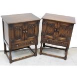 A pair of oak twin-door linen-fold panelled cabinets,