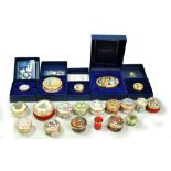 A small collection of Halcyon Days enamel trinket and pill boxes to include Christmas boxes, a boxed