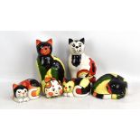 LORNA BAILEY; six money boxes comprising five modelled as cats and one as pig, all signed and with