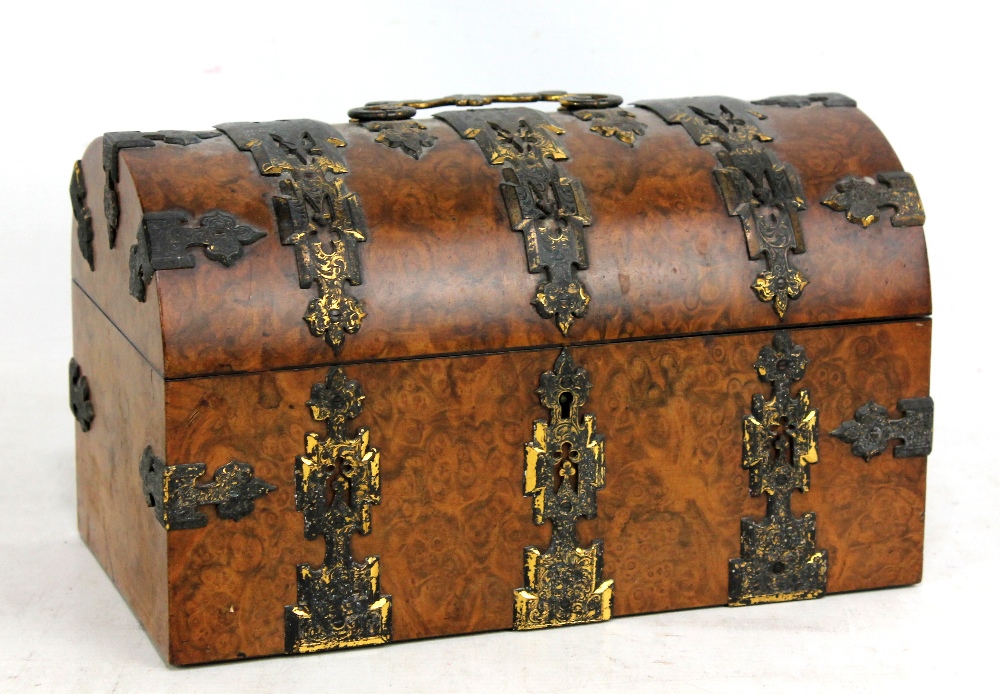 A Victorian burr walnut and brass strapwork decorated dome topped stationery box with plaque