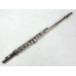 RUDALL CARTE & CO LTD OF LONDON; an electroplated 'Romilly' student flute, number 256168, cased.