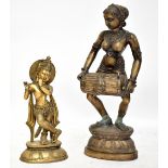 A 20th century Indian cast brass figure of Radha Krishna playing flute, on lotus base, height
