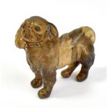 ATTRIBUTED TO FABERGÉ; a well carved rock crystal model of a King Charles Spaniel with gem set