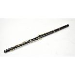 V KOHLERT & SONS OF GRASLITZ; a three piece flute with nickel plated mounts, no. 815.Additional