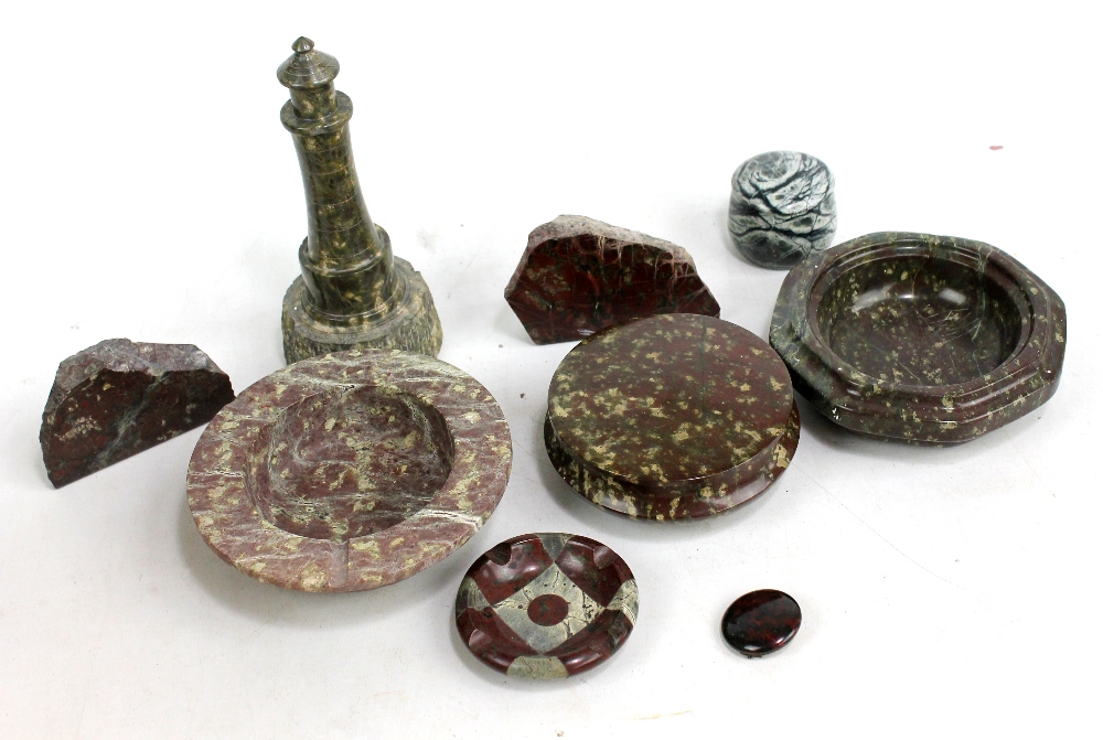 A small group of carved Cornish Serpentine including model of Bishop Rock lighthouse, height 17cm,