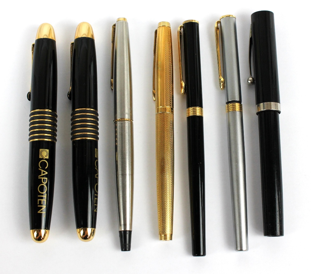 A group of pens including a Parker stainless steel fountain pen, etc (7).