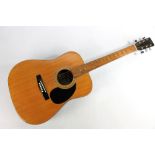 A CSL Memphis acoustic guitar, model no.HF-402 with interior paper label, length approx 101.5cm.