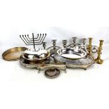 A group of electroplated items to include an entree dish, a set of coasters, a pair of candelabra,