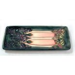 MOORCROFT; a 'Cluny' pattern tubeline decorated rectangular dish, impressed marks and year cipher