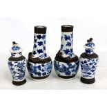 A pair of late 19th century Chinese crackle glazed vases with raised lizard decoration, stylised