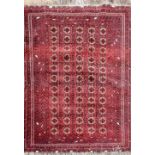 A Tekke Bokhara red ground rug, 203 x 146.5cm.