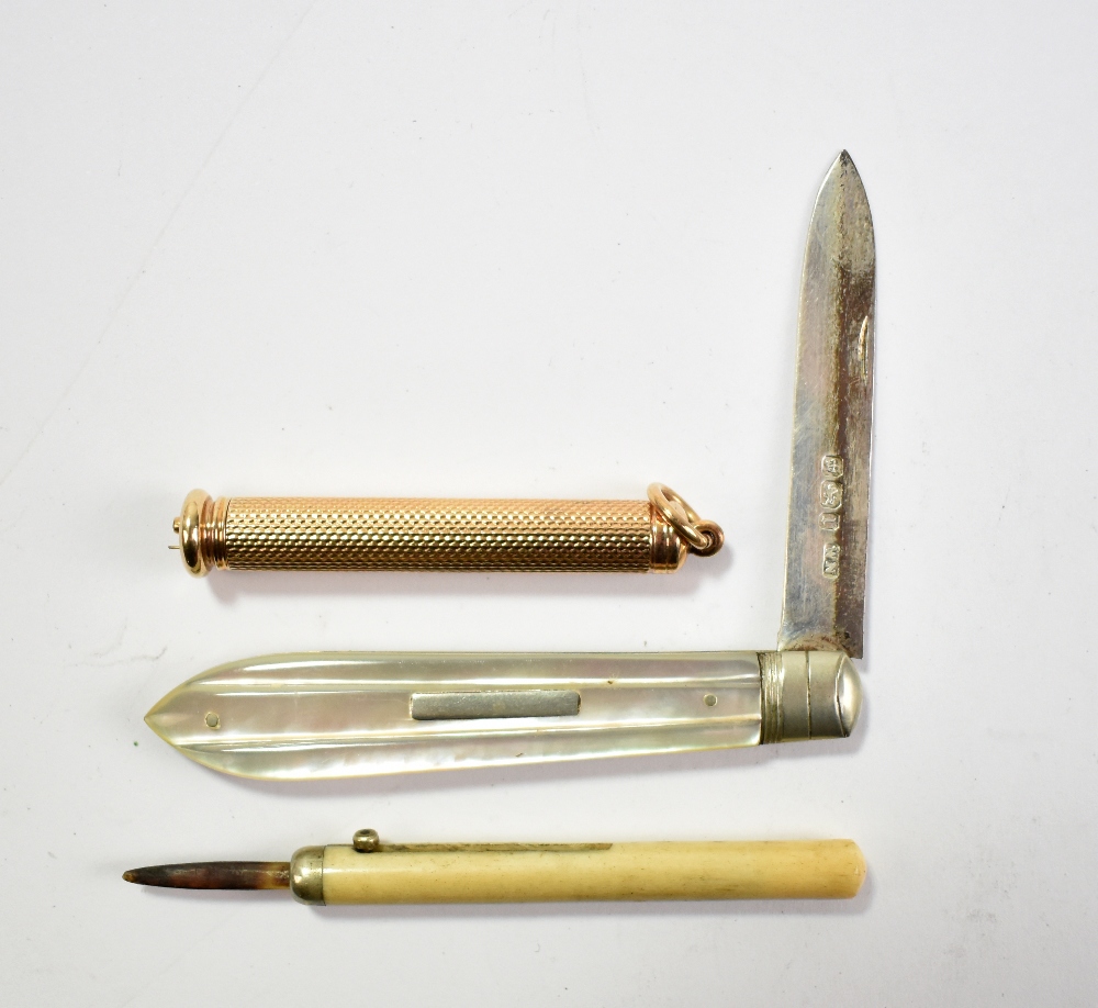 A 9ct engraved yellow gold propelling combination dip pen and pencil, a propelling bone cased